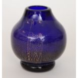 A contemporary studio glass vase of footed ovoid form with tapered collar neck,