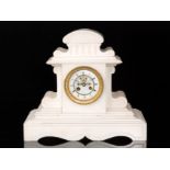 A late 19th Century white marble mantle clock of classical form the circular dial with anchor