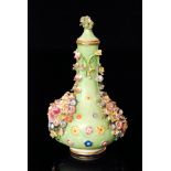 A 19th Century Derby vase and cover,