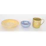 Three pieces of assorted Ruskin Pottery lustre glaze comprising a mottled yellow and blue coffee