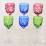 A Harlequin set of six later 20th Century crystal hock glasses with colour cased ovoid bowls in
