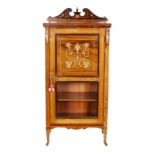 A late 19th Century inlaid rosewood music cabinet enclosed by a part panel and part glazed door