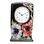 A Moorcroft Pottery mantel clock decorated in the Anemone Tribute pattern, designed by Emma Bossons,