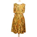 A 1960s Christian Dior Modele Original lady's sleeveless vintage dress in a bamboo leaf pattern