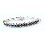 An 18ct sapphire and diamond bracelet,