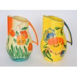Two 1930s Beswick shape 119 Art Deco jugs each with hand painted decoration,