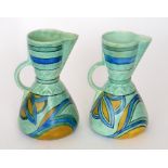 A pair of 1930s Art Deco British Roskyl Pottery jugs each decorated with abstract floral motifs in