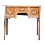 A George III oak lowboy fitted with three drawers on square champhered legs, width 77cm.