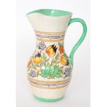 A 1930s Charlotte Rhead for Bursley Ware TL14 jug decorated with tubelined tulips,