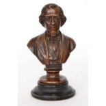 A 20th Century bronze bust of Beaconsfield named to the front on ebonised socle base,