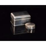 An Edwardian hallmarked silver ring box of plain rectangular form,