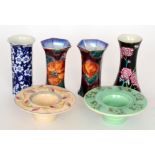 Six assorted early 20th Century vases of varying form,