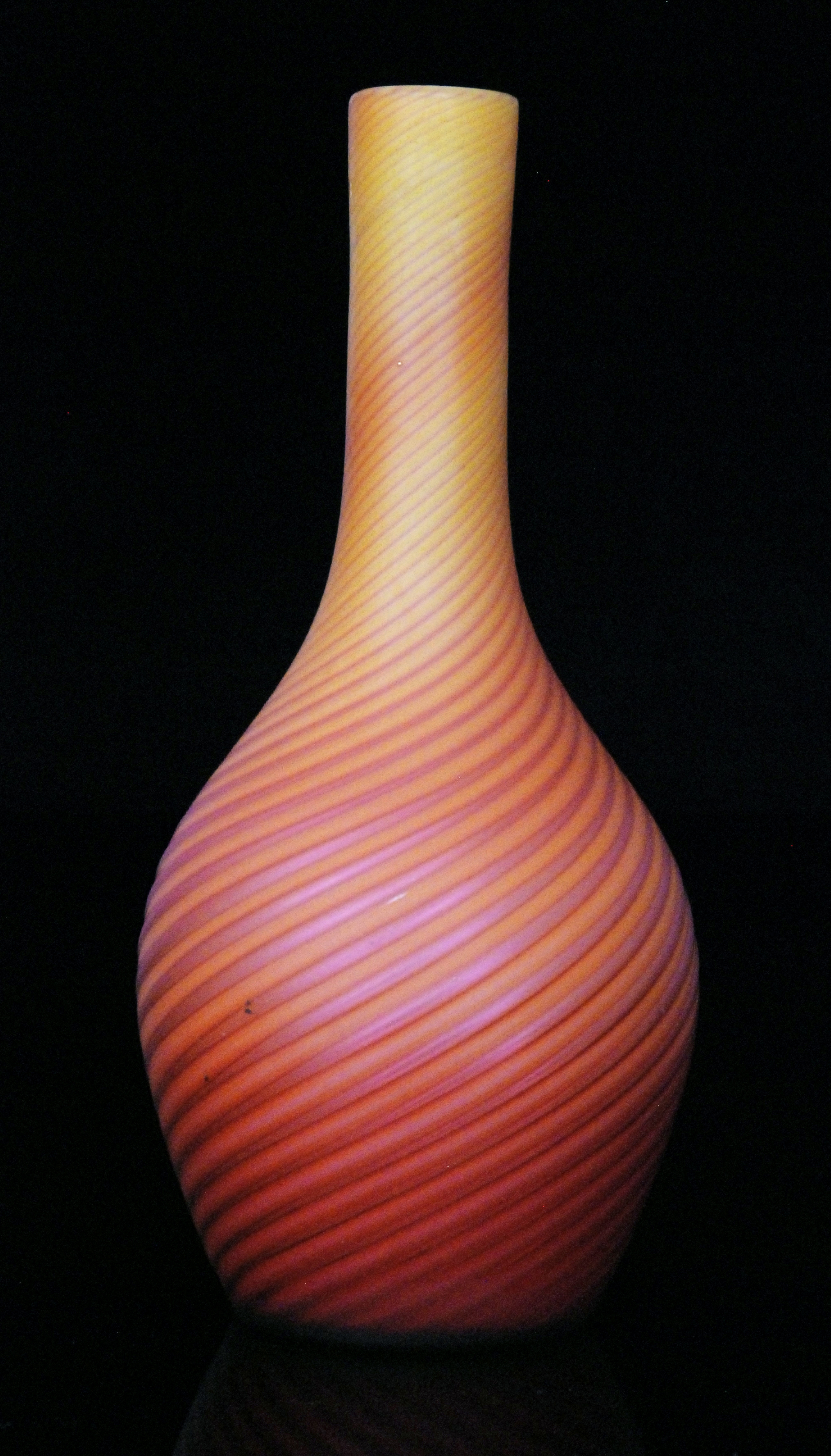 A late 19th Century Stevens & Williams Verre de Soie vase of slender bottle form with tall collar