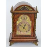 A late 19th Century oak bracket clock,