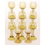 A small assorted collection of 19th Century Roemer style wine glasses with ovoid bowl above a