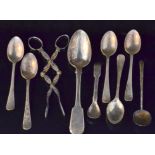 A small parcel lot of hallmarked silver spoons to include a George III fiddle pattern tablespoon,