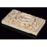 A late 19th Century Chinese carved ivory card case of rectangular form,