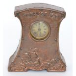 An early 20th Century 'Tempus Fugit' mantel clock in the Arts and Crafts style,
