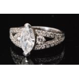 An 18ct white gold diamond ring, central marquise claw set stone, weight approximately 1ct,