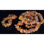 A natural amber free form graduated necklace,