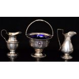 A hallmarked silver swing handle pedestal bowl with pierced frieze border and beed and reel