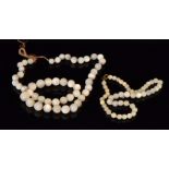 A graduated moonstone bead necklace, comprising 49 beads, length 24cm, S/D,