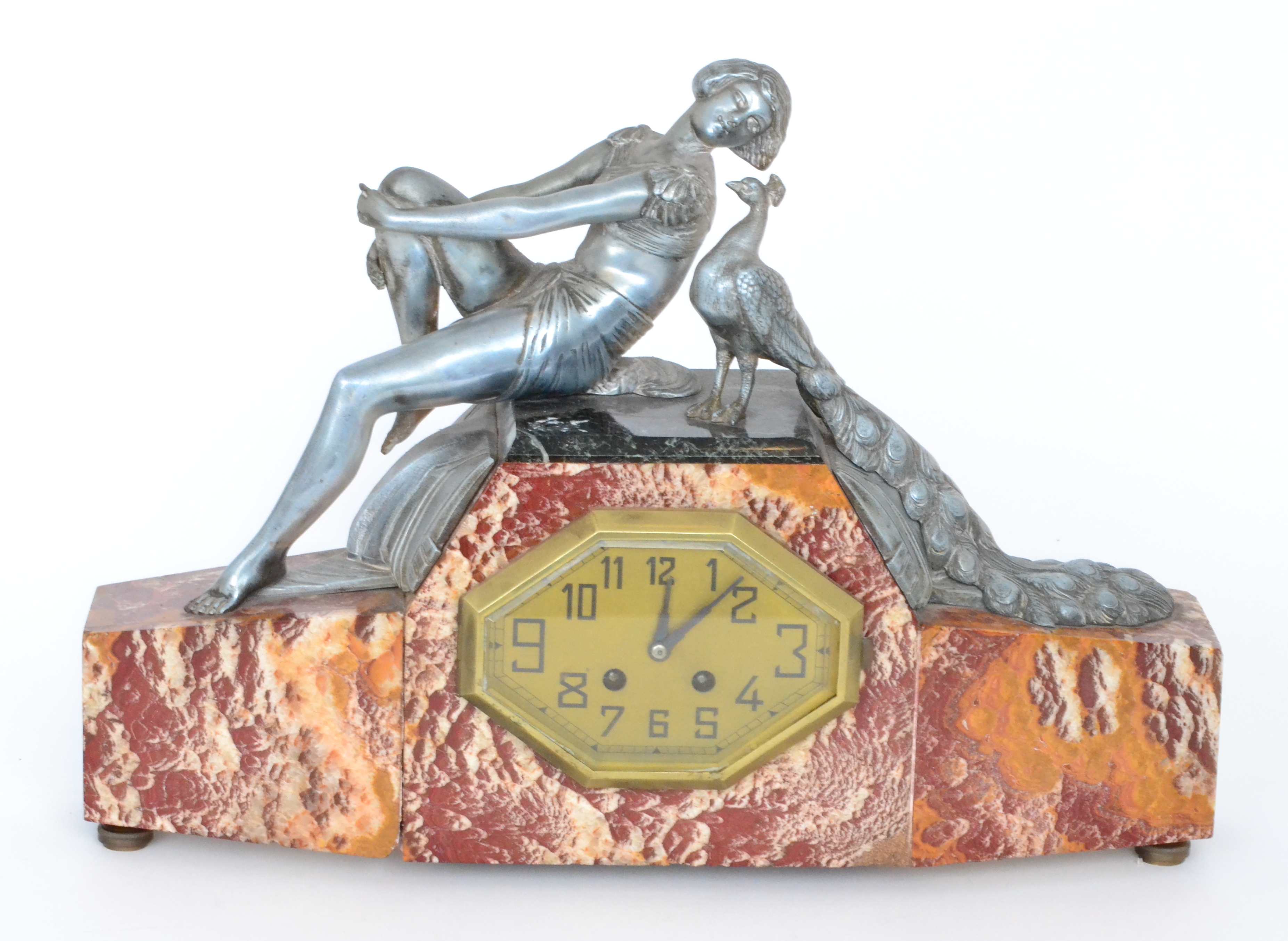 A 1930s Art Deco marble and spelter eight day mantle clock,