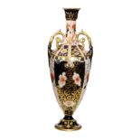 A late 19th to early 20th Century Royal Crown Derby twin handled vase decorated in the 1267 Imari