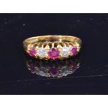 An early 20th Century 18ct ruby and diamond boat shaped ring,