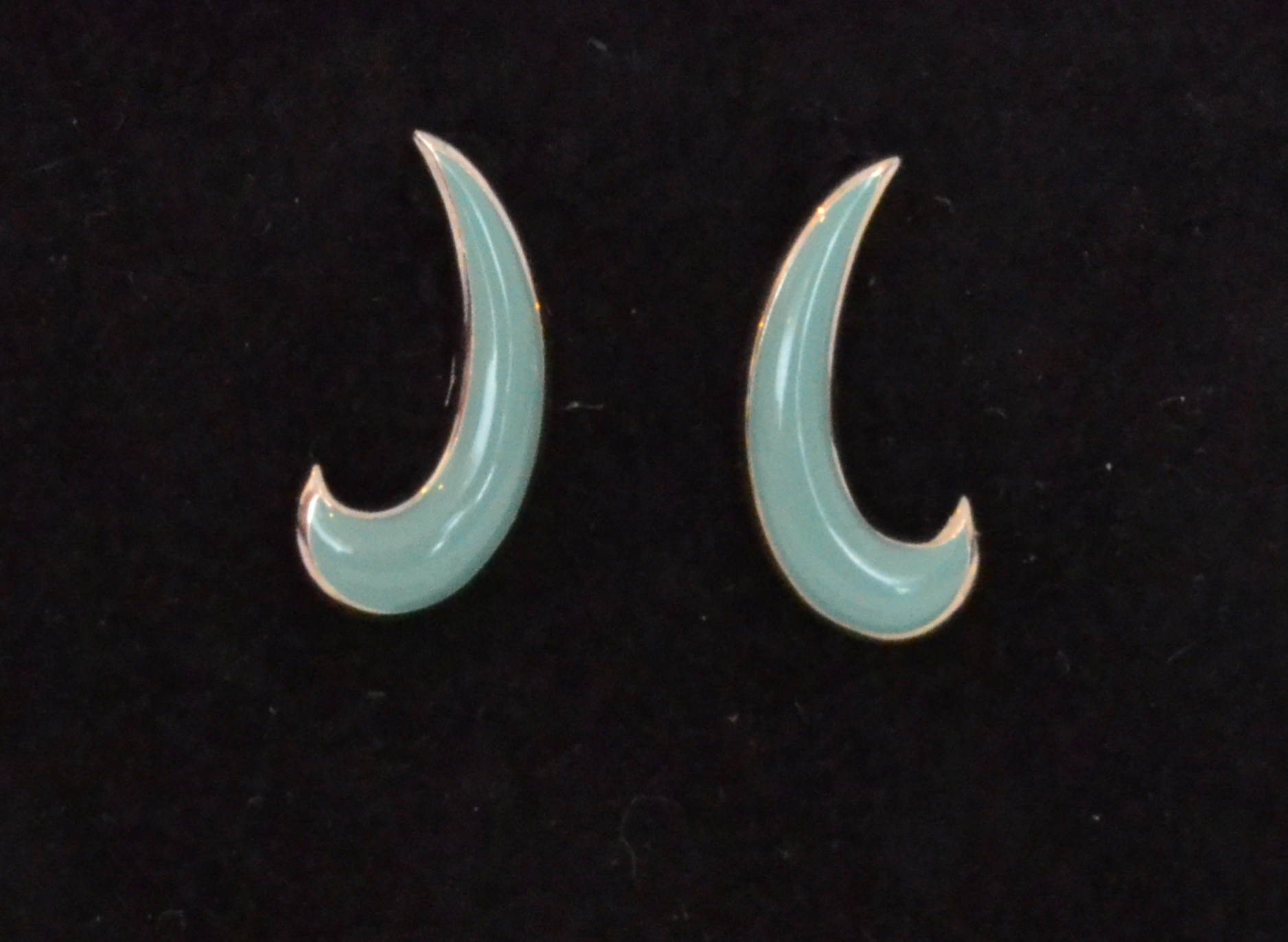 A pair of Lucy Quartermaine sterling silver celadon green enamelled moon stud earrings,