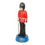 A mid 20th Century advertising standing figure of a Guardsman for Exclusive Pipe Tobacco,