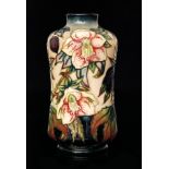 A Moorcroft Pottery Hellebore pattern vase of waisted form,