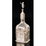 A 19th Century Dutch silver mounted glass decanter of square form with canted sides,