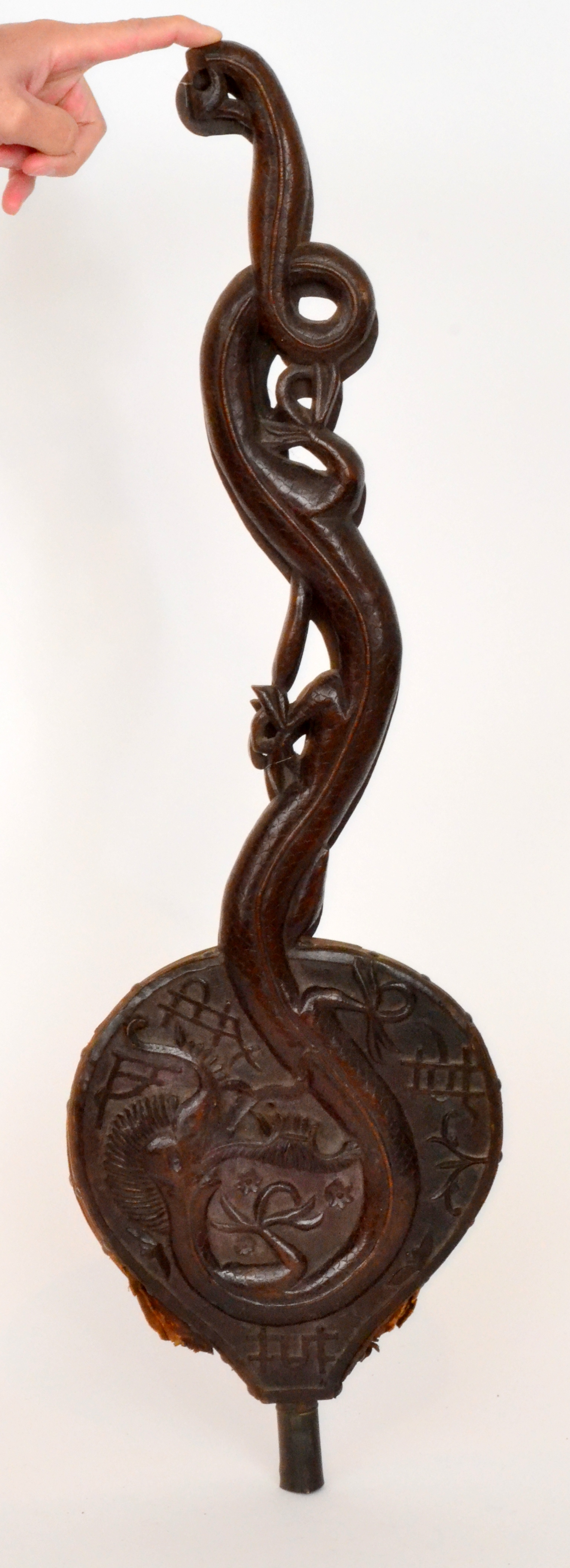 A pair of Edwardian carved hardwood bellows in the form of dragons and symbols,