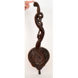 A pair of Edwardian carved hardwood bellows in the form of dragons and symbols,