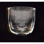 A post-war Orrefors crystal glass vase of compressed facet form,