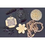 A small group of Victorian jewellery to include a jet cameo mourning brooch of a classical maiden