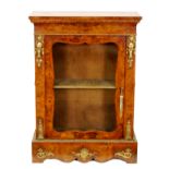 A 19th Century Louis XIV style crossbanded and line inlaid gilt metal mounted pier cabinet enclosed