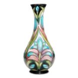 A Moorcroft Pottery slender baluster vase decorated in the Cleopatra pattern designed by Sian
