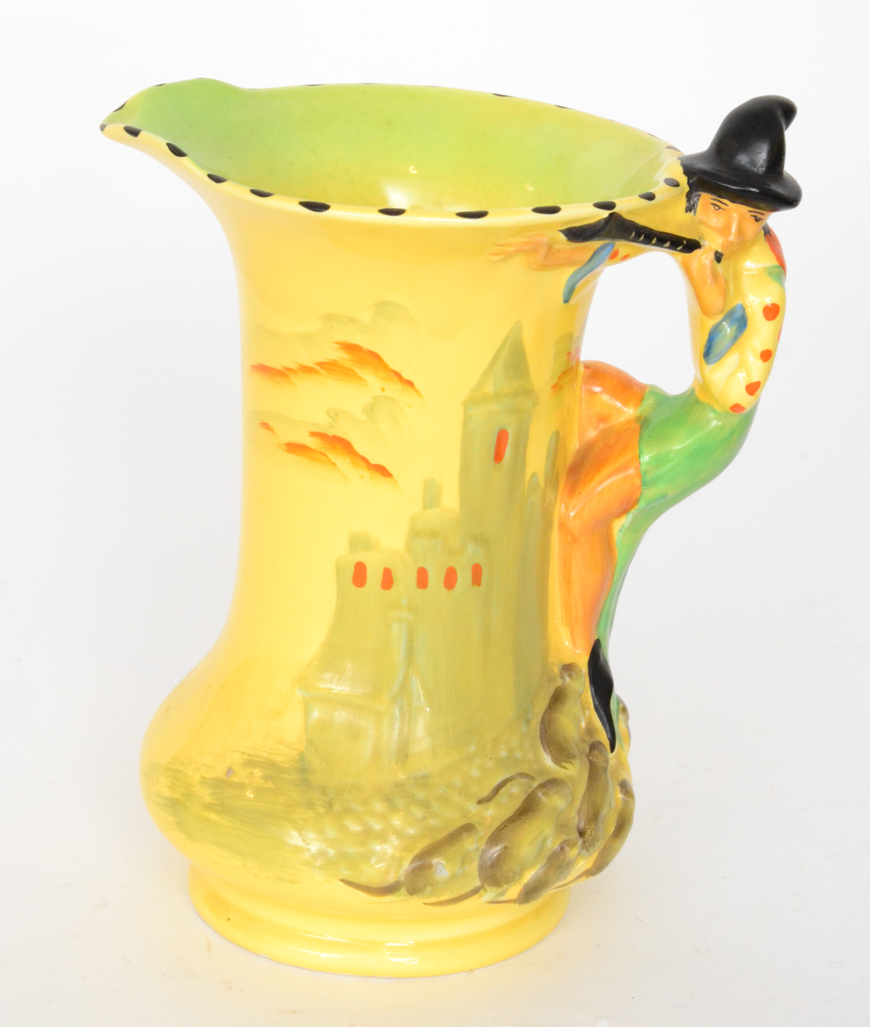 A 1930s Burleigh Ware novelty Pied Piper flower jug relief moulded with a castle landscape and