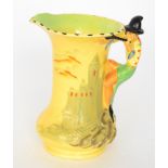 A 1930s Burleigh Ware novelty Pied Piper flower jug relief moulded with a castle landscape and