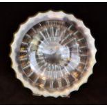 A large mid 20th Century Orrefors clear crystal glass bowl of shallow circular form,