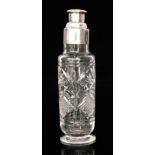 A George V silver mounted cut glass cocktail shaker of cylindrical form with pull off cover and