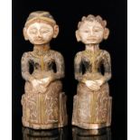 A pair of 20th Century carved hardwood Indian figures, height 45cm.