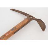 An ice axe with ash shaft, circa 1960,