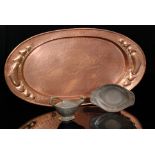An Art Nouveau oval copper serving tray width 56cm together with a pewter Kayserzinn pewter lamp