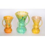 Three 1930s Art Deco Beswick shape 394 vases each of double gourd form with a flared trumpet neck