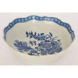 A late 18th Century First Period Worcester shallow bowl decorated in the underglaze blue and white