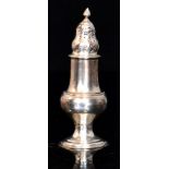 A George III hallmarked silver baluster shaped caster of typical form with stepped circular foot