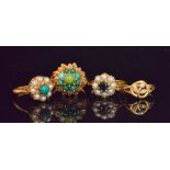 Four 9ct stone set rings to include a turquoise, sapphire and split pearl examples.